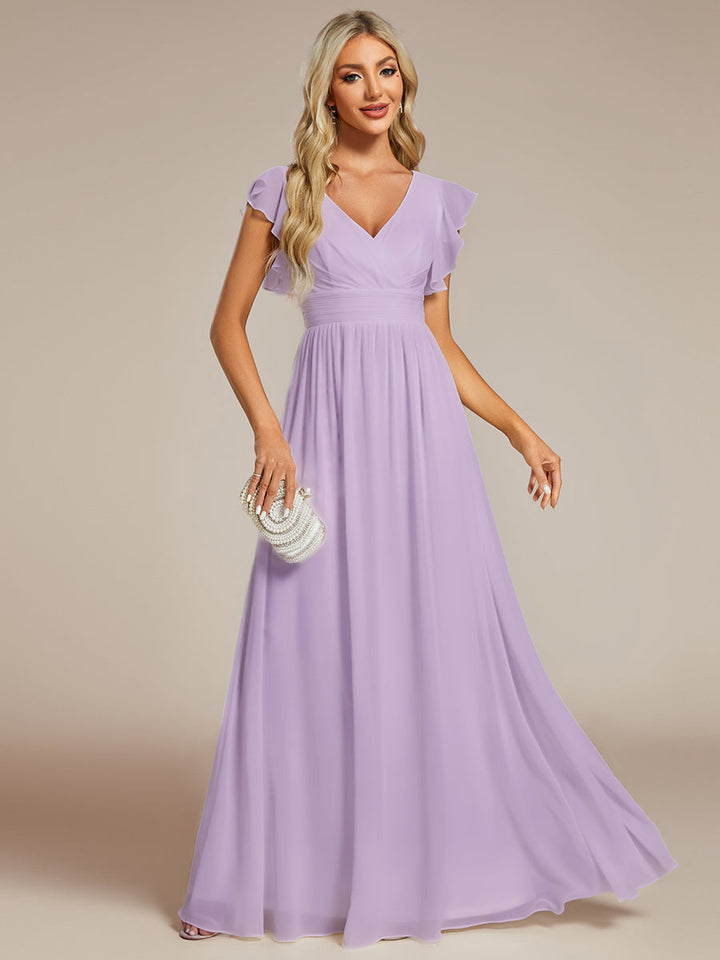 Robe longue femme, dos ouvert, manches courtes. Élégante pour une soirée ou un mariage d'été en toute beauté.