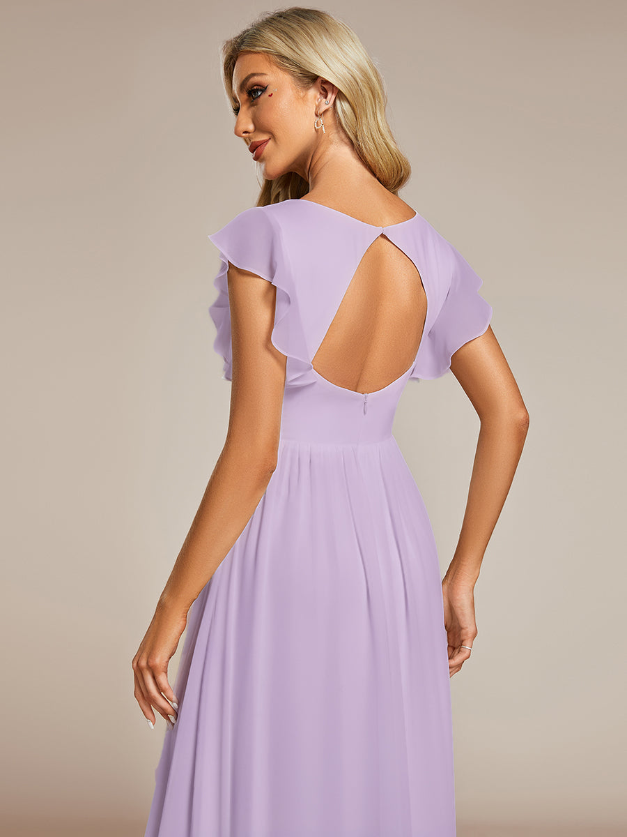 Robe de soirée élégante, dos ouvert, col en V. Fluide et maxi pour femme. Parfaite pour une fête chic et romantique.