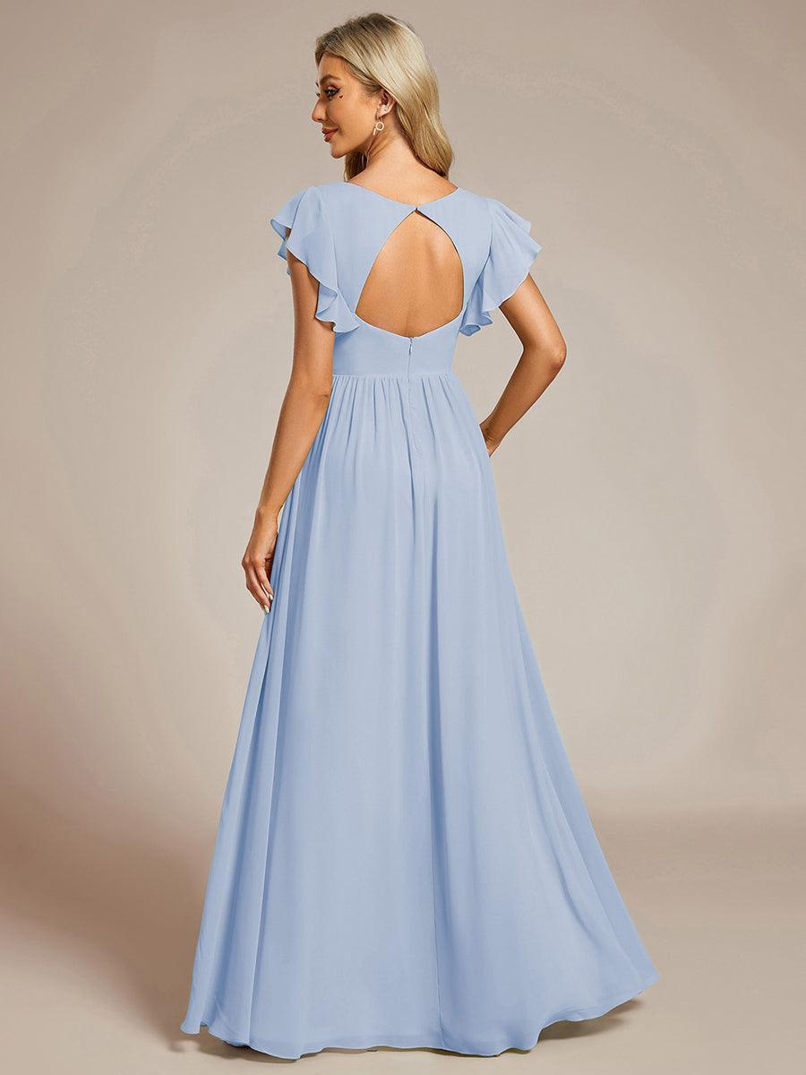 Robe de fête, dos ouvert, col en V, manches courtes. Fluide et maxi pour femme élégante.