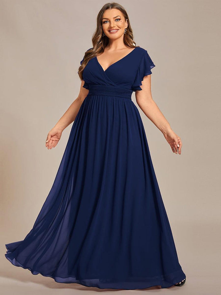 Robe fluide, col en V, dos ouvert, manches courtes. Élégante pour demoiselle d'honneur ou cérémonie.