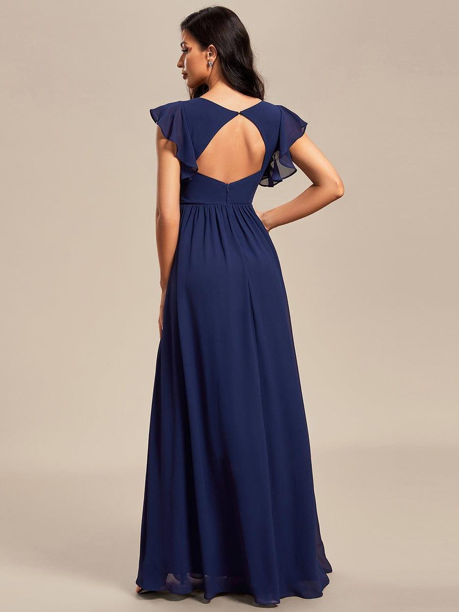 Robe longue femme, col en V, dos ouvert, coupe fluide. Élégante pour toute occasion spéciale.
