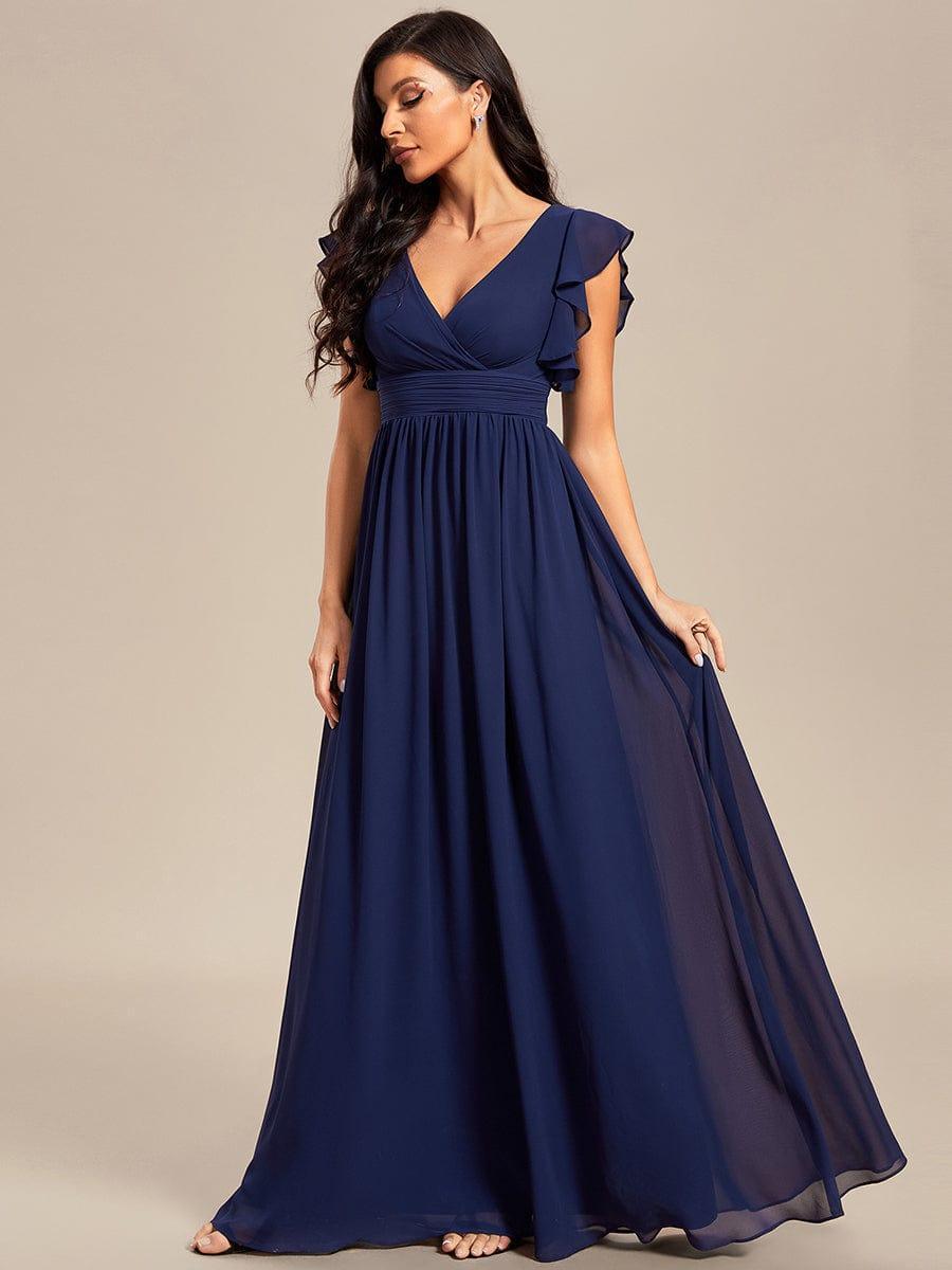 Robe de demoiselle d'honneur chic, dos ouvert. Idéale pour cérémonie, mariage ou fête estivale.