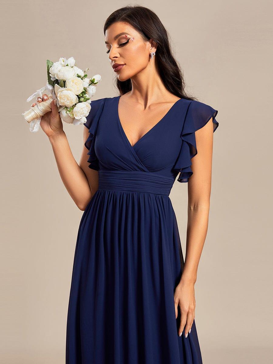 Robe maxi fluide, dos ouvert, manches courtes. Élégante pour demoiselle d'honneur ou invitée.