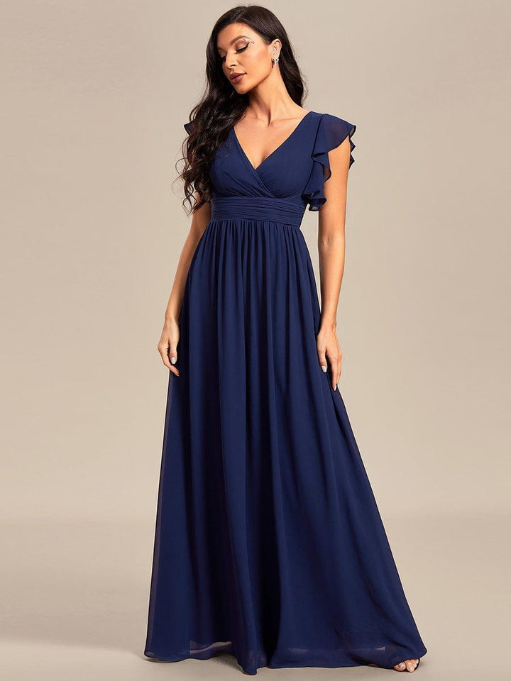 Robe de soirée femme, dos ouvert, longueur maxi. Parfaite pour une fête chic ou un mariage.