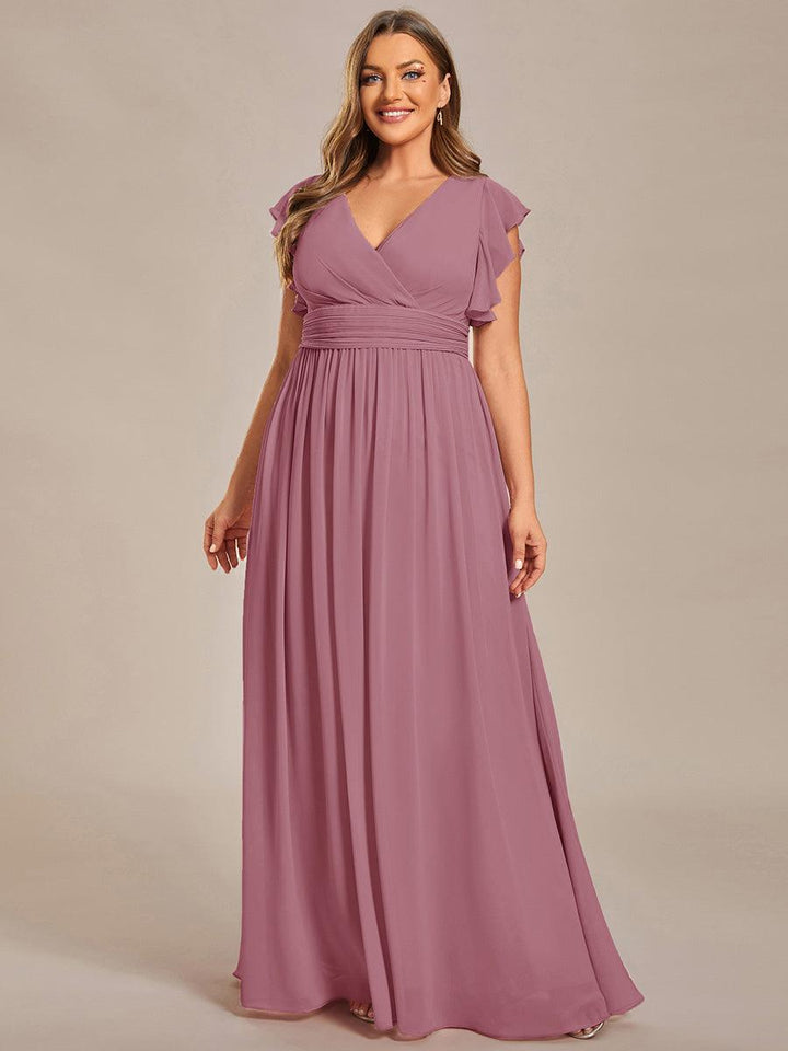 Robe de fête femme, dos ouvert, manches courtes. Fluide et maxi pour un look estival élégant et stylé.