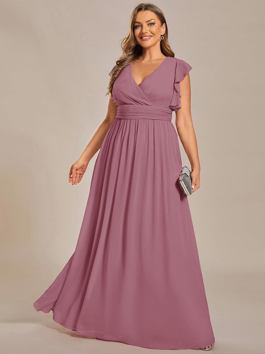Robe de soirée élégante, dos ouvert, col en V. Fluide et maxi pour femme. Parfaite pour la fête chic.