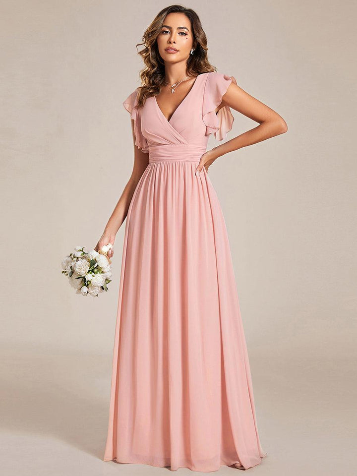 Robe fluide, dos ouvert, col en V, longueur maxi. Élégante pour demoiselle d'honneur, mariage d'été exceptionnel.