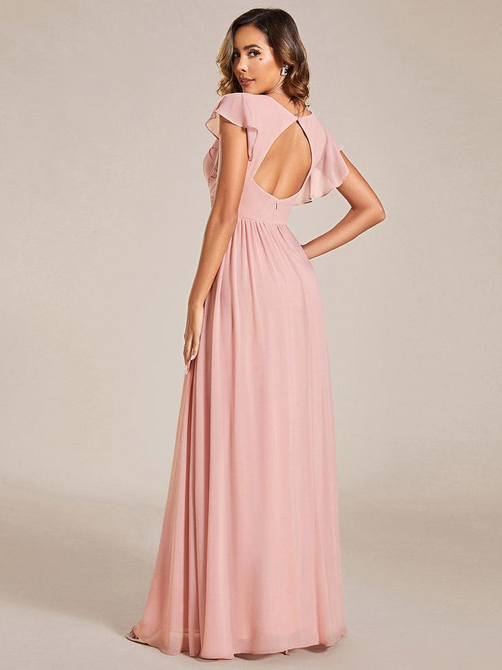 Robe longue femme, dos ouvert, col en V. Élégante pour une cérémonie ou soirée de printemps chic et raffinée.