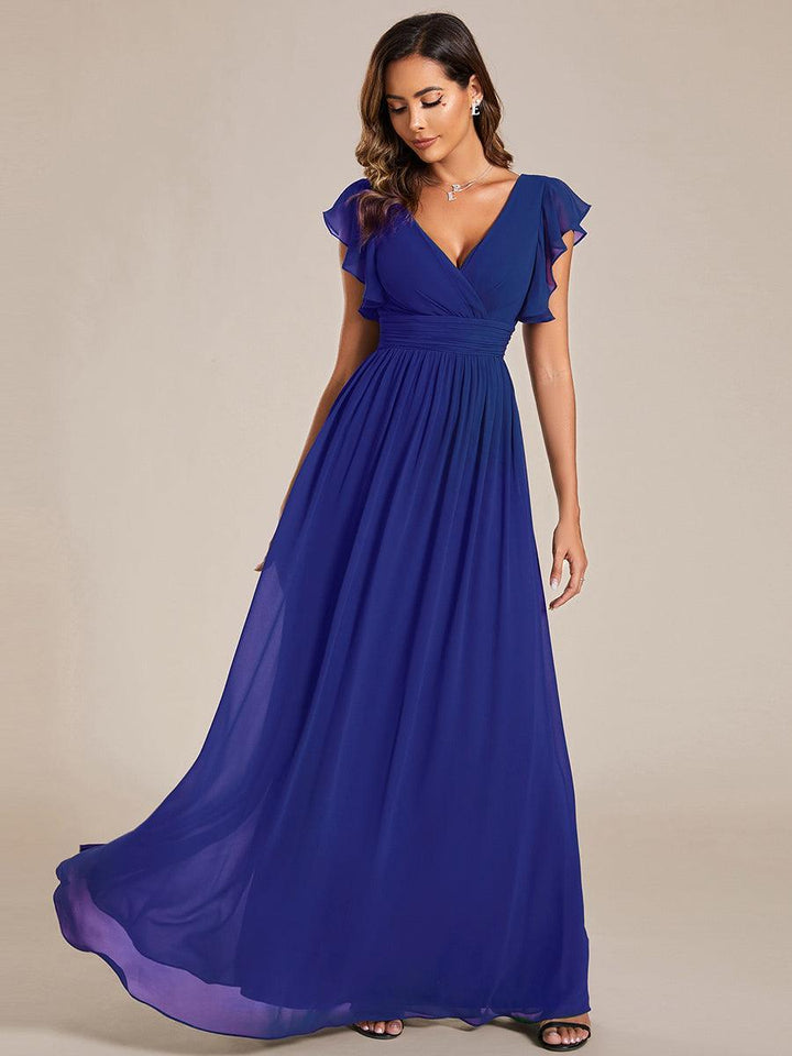 Robe de demoiselle d'honneur élégante, dos ouvert, fluide. Parfaite pour cérémonie ou mariage.