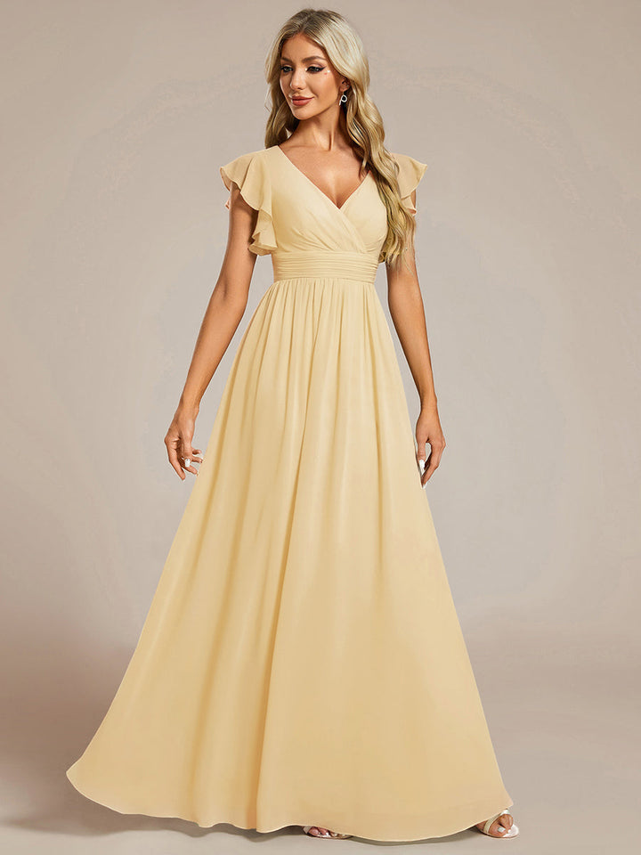 Robe de cérémonie femme, dos ouvert, col en V. Longue et fluide pour un look estival parfait et délicat, femme.