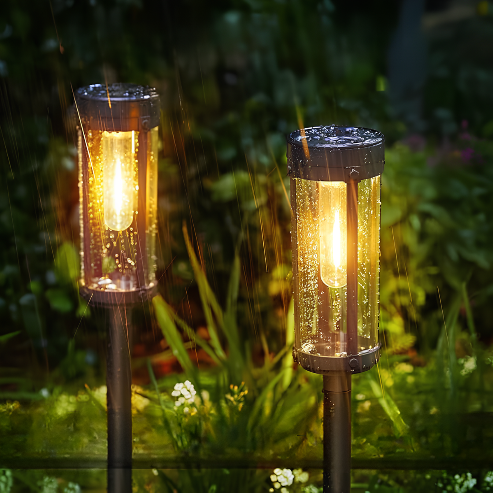 Lampe solaire LED jardin à piquet, éclairage chemin extérieur élégant, ambiance moderne et lumineuse.