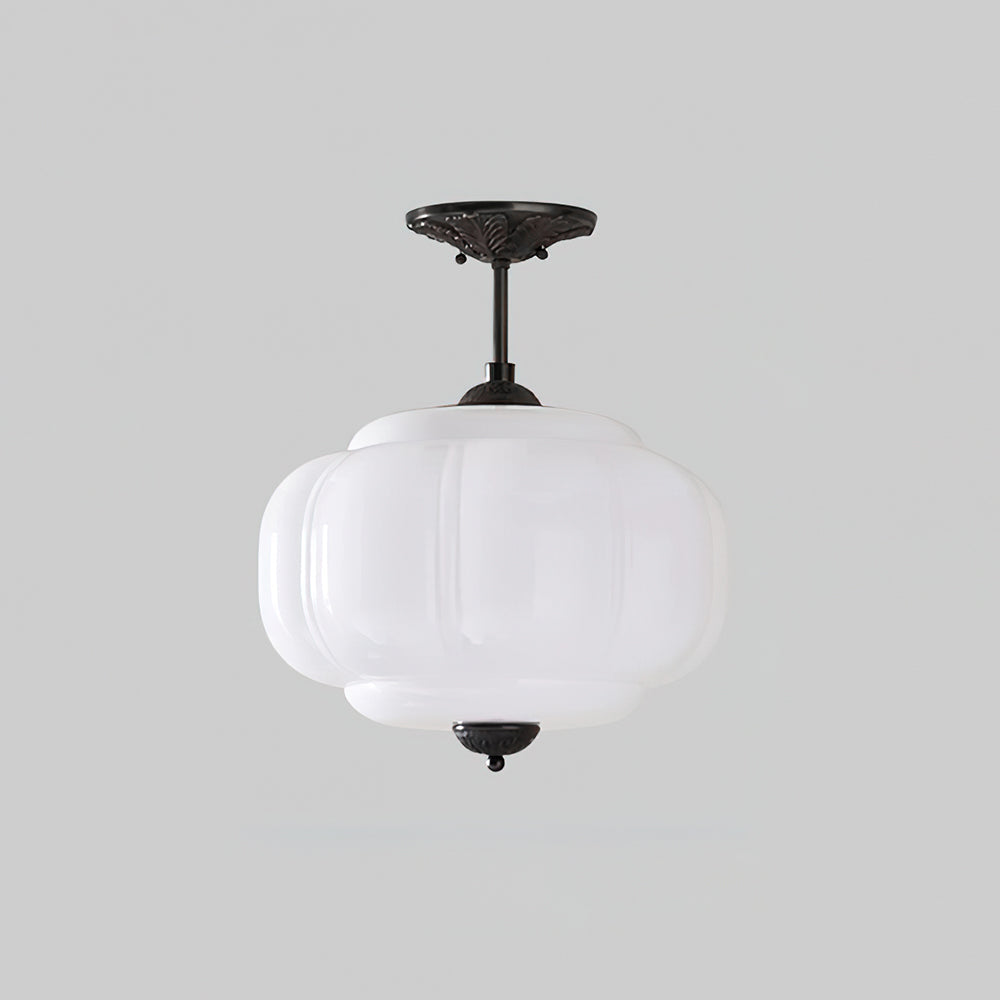 Élégante lampe de plafond en verre semi-encastrée, forme arrondie, pour tout intérieur moderne.