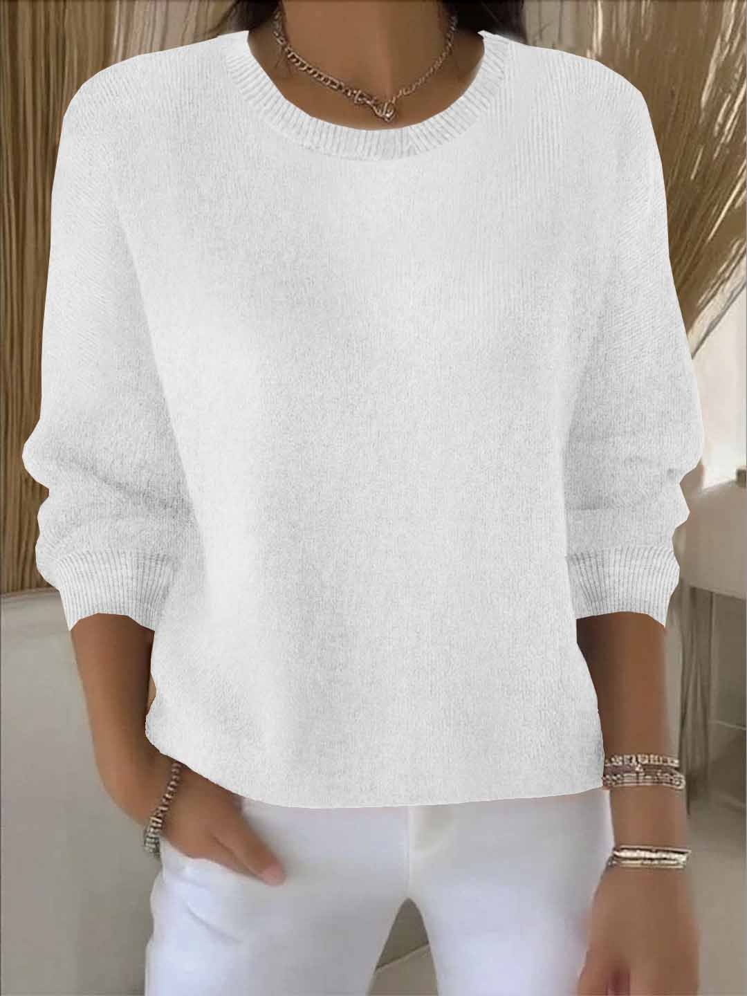 Vêtement polyvalent : pull femme élégant, essentiel garde-robe d'hiver.