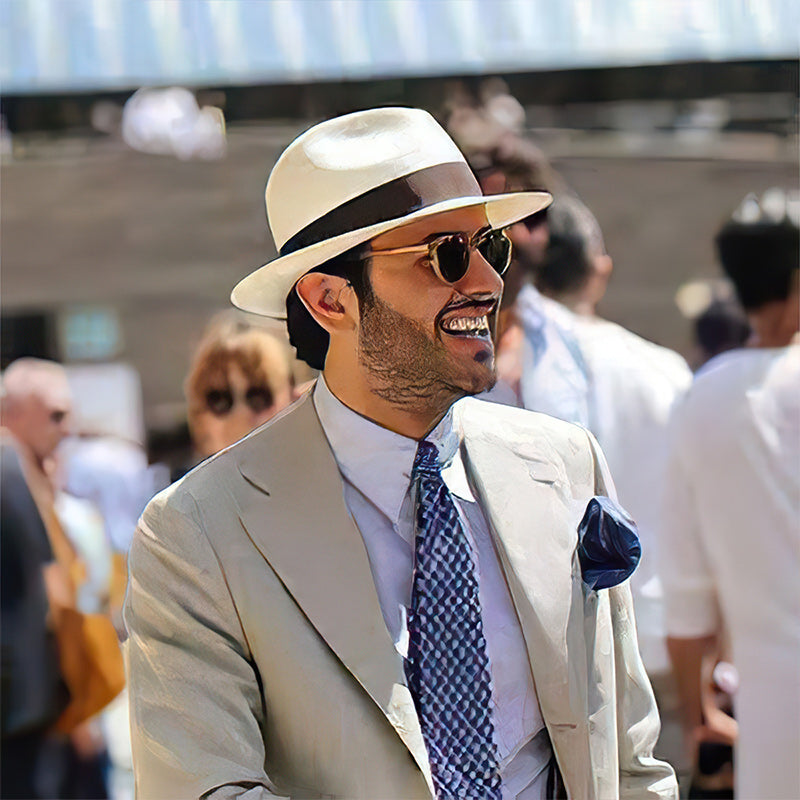 Chapeau Panama classique unisexe, intemporel et élégant. Léger, idéal pour une protection solaire estivale raffinée.