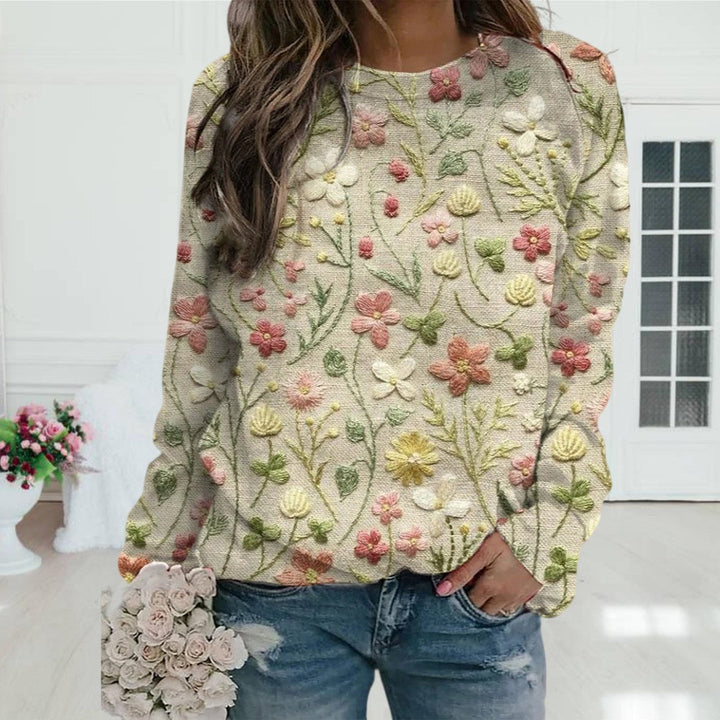 Pull femme confortable à motifs floraux en relief, tricot élégant à manches longues pour printemps décontracté.