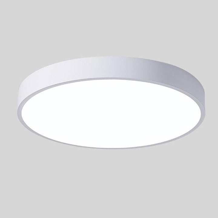 Luminaire de plafond Macaron, apportant modernité et lumière douce à votre intérieur.