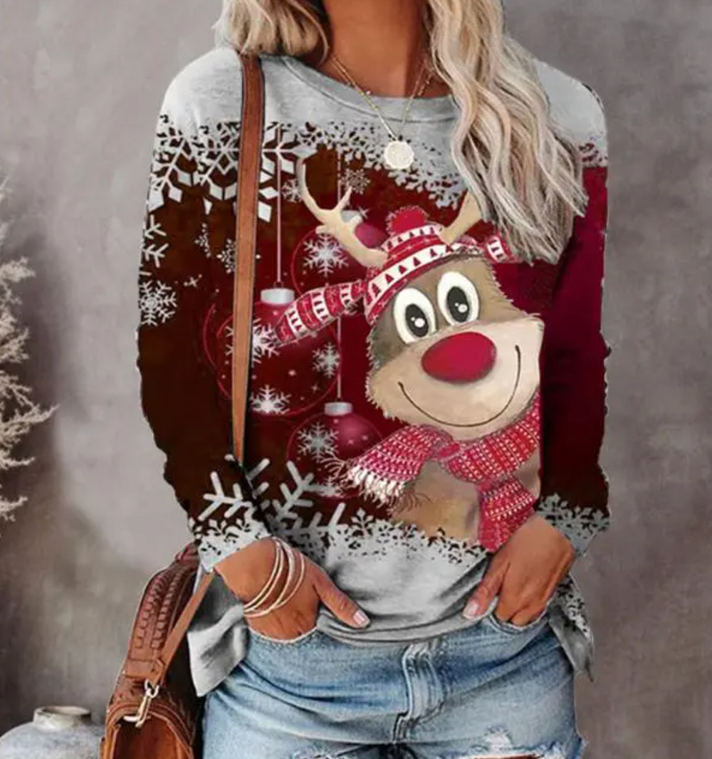 Chandail de Noël pour femme, confortable et décontracté, parfait pour un style hivernal chaleureux ou comme cadeau.