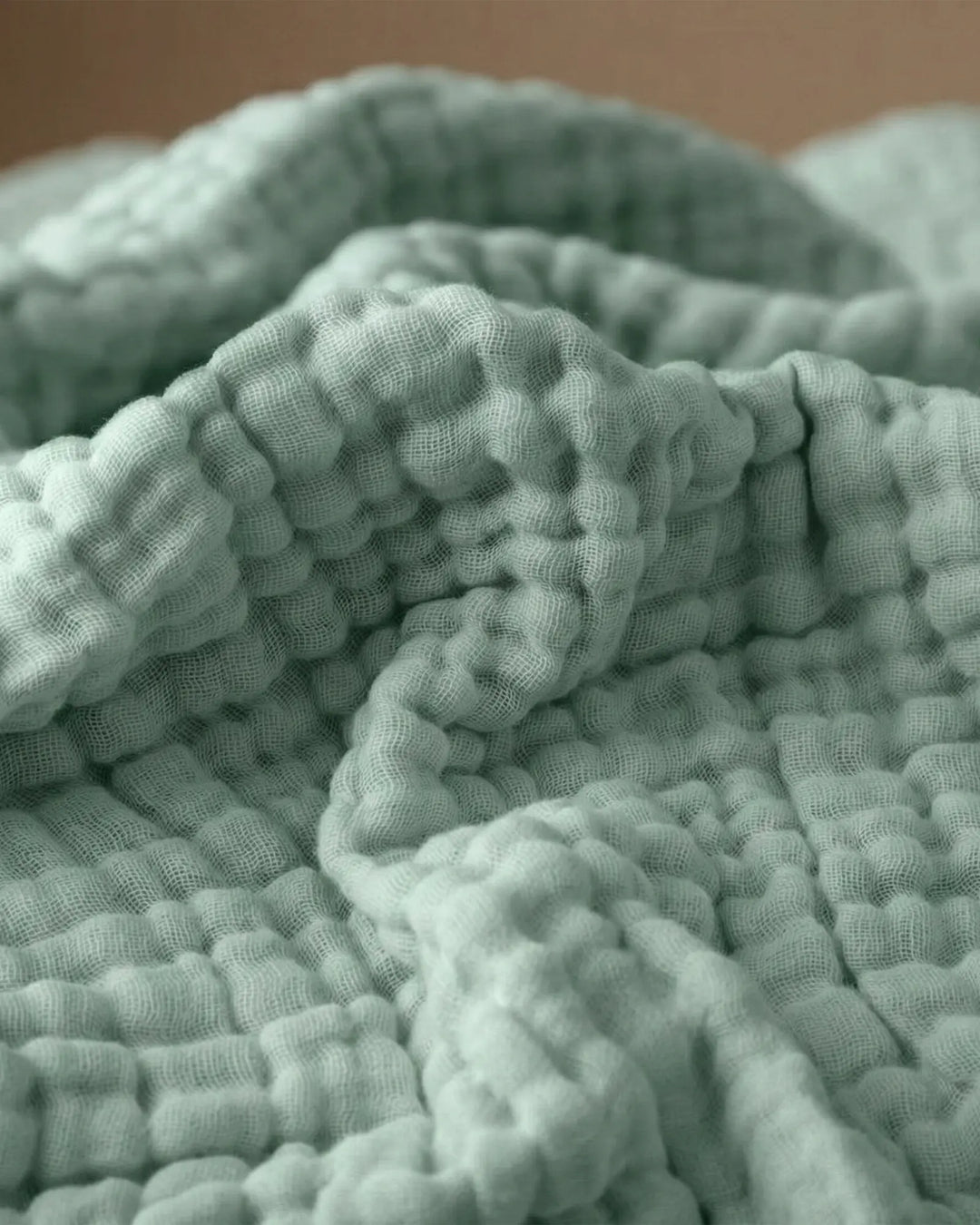 Couverture en mousseline de coton, ultra-douce et légère, parfaite pour la décoration intérieure.