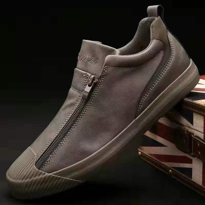 Chaussures quotidiennes homme Noah. Baskets décontractées avec zip, offrant confort et élégance facile pour toutes occasions.