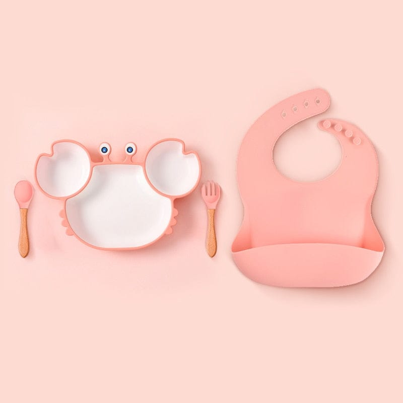 Assiette bébé design crabe en silicone durable, antidérapante. Encourage l'autonomie et l'alimentation saine de l'enfant.