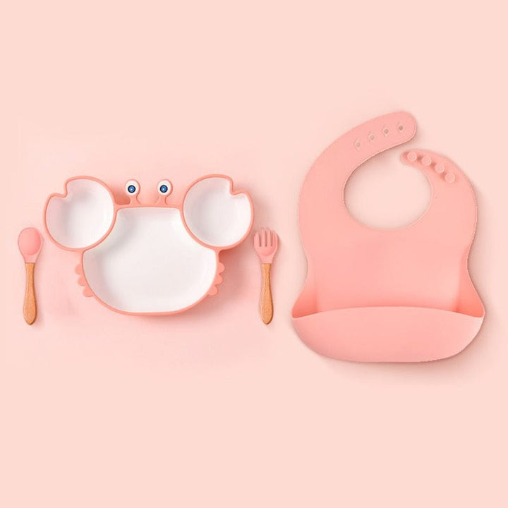 Assiette bébé design crabe en silicone durable, antidérapante. Encourage l'autonomie et l'alimentation saine de l'enfant.