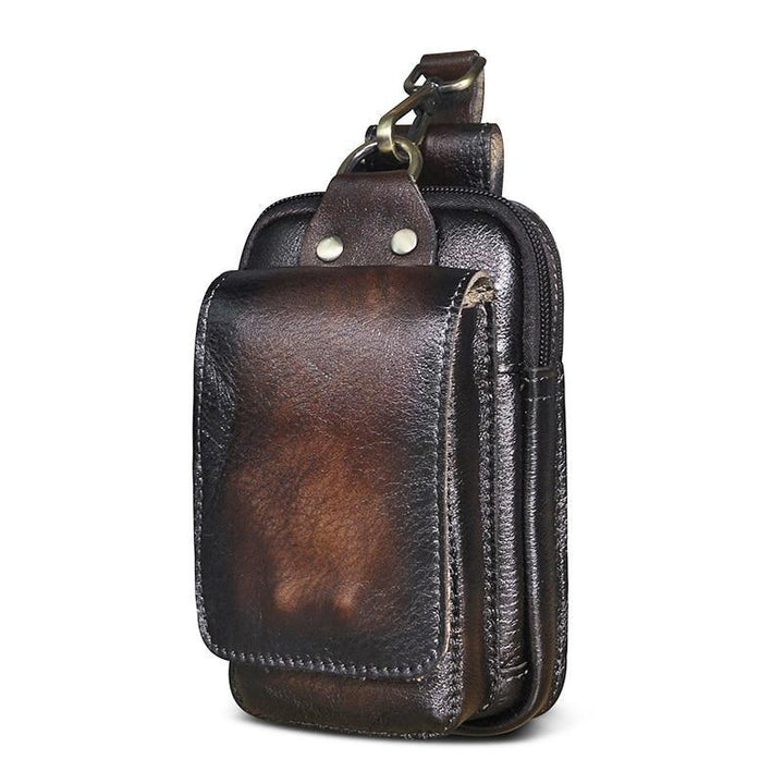 Sac à bandoulière homme en cuir marron, compact, organisateur pratique au quotidien.