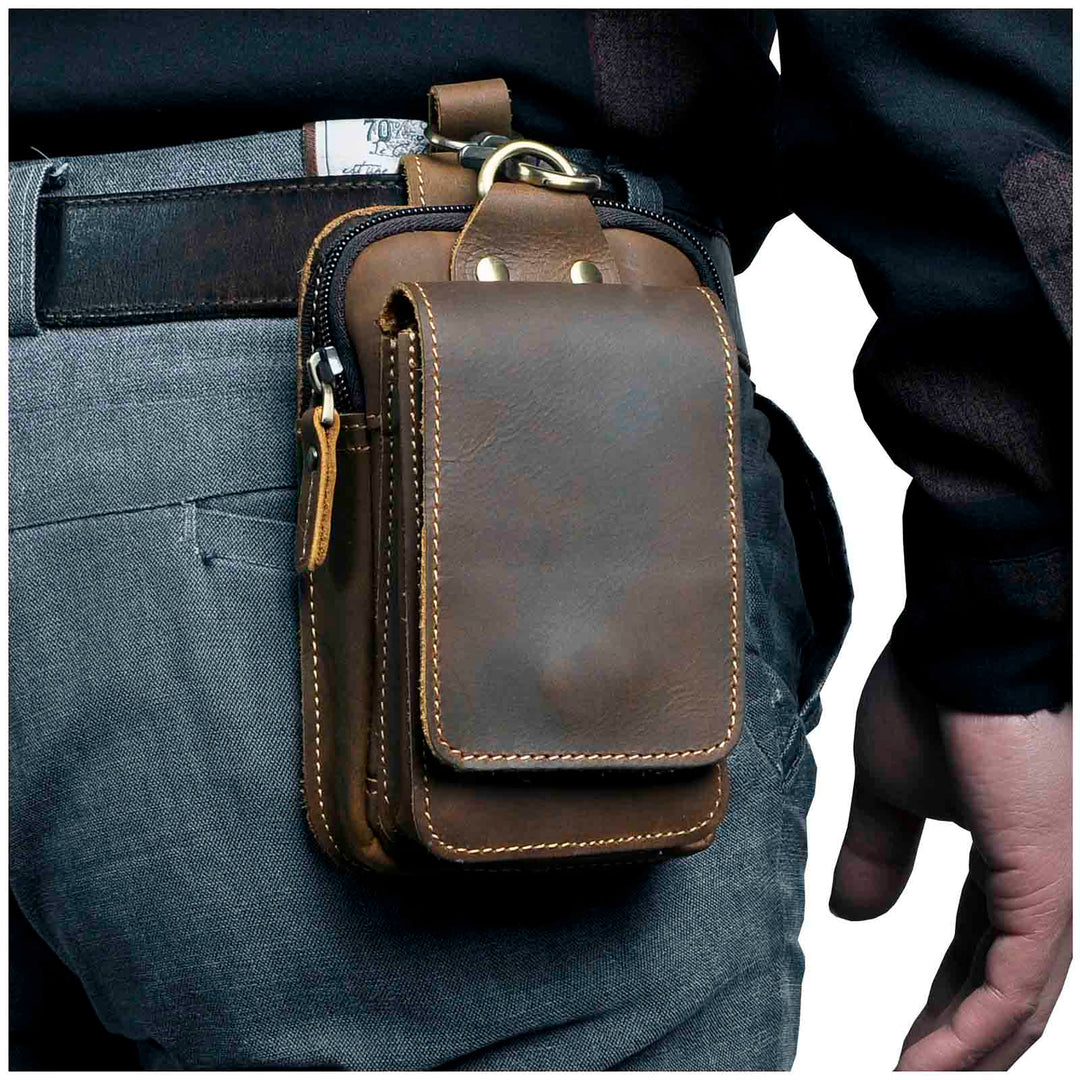 Sacoche ceinture homme en cuir noir, élégante, pour téléphone et petits objets essentiels.