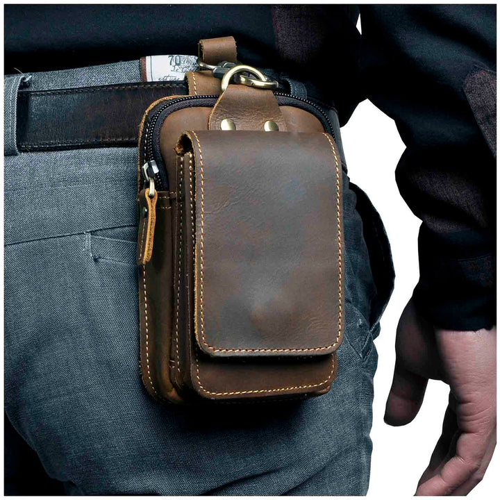 Sacoche ceinture homme en cuir noir, élégante, pour téléphone et petits objets essentiels.