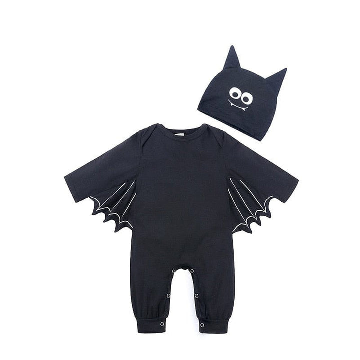 Bébé en costume de chauve-souris noir et violet, avec des ailes douces. Tenue unisexe mignonne pour Halloween.