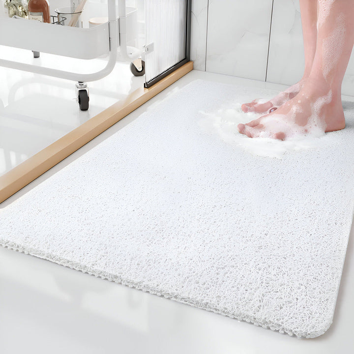 Tapis de douche durable, facile d'entretien, antimoisissure et séchage rapide pour une hygiène optimale en salle de bain.