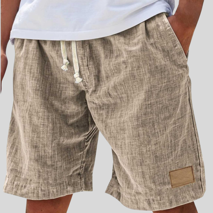 Short homme décontracté bleu, idéal plage & loisirs estivaux, taille élastique confortable.