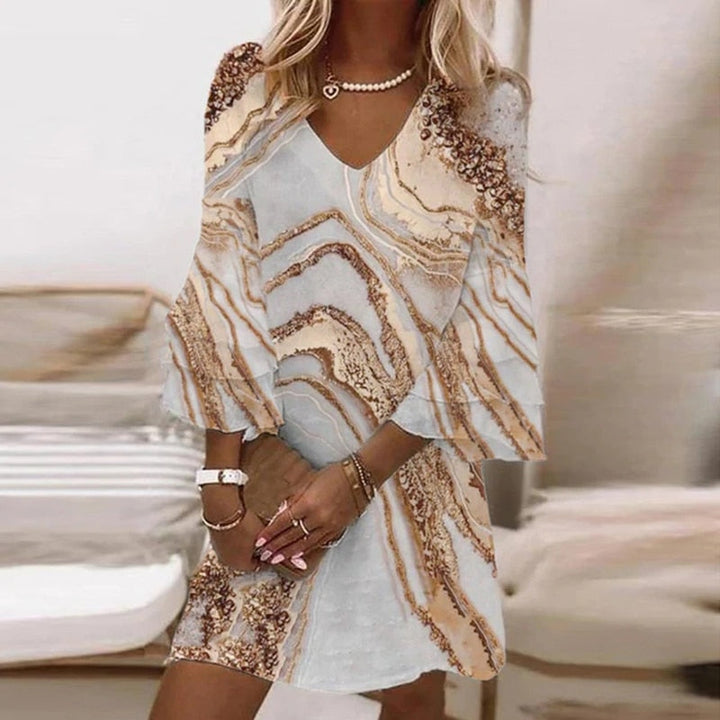 Robe fluide imprimée pour femmes, confort absolu, matière légère et respirante, idéale pour les looks d'été stylés.