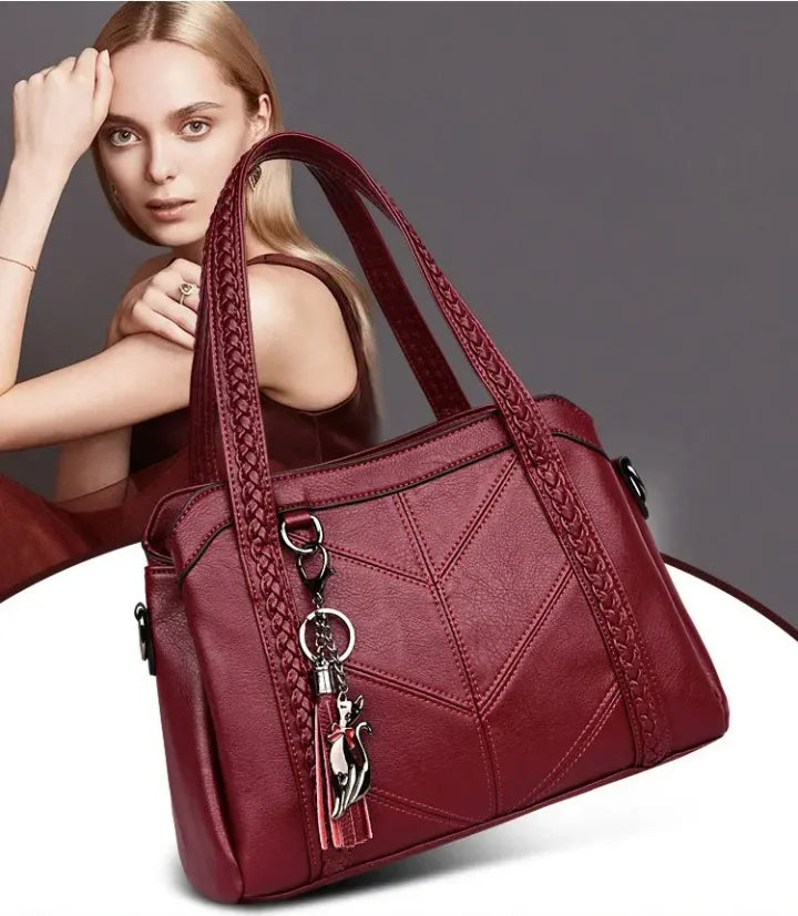 Sac à main femme élégant en cuir PU noir, spacieux et idéal pour le quotidien et la mode.