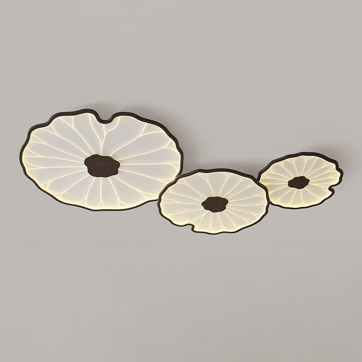 Plafonnier LED Solara, feuille de lotus en bois naturel, éclairage doux et moderne pour votre salon.
