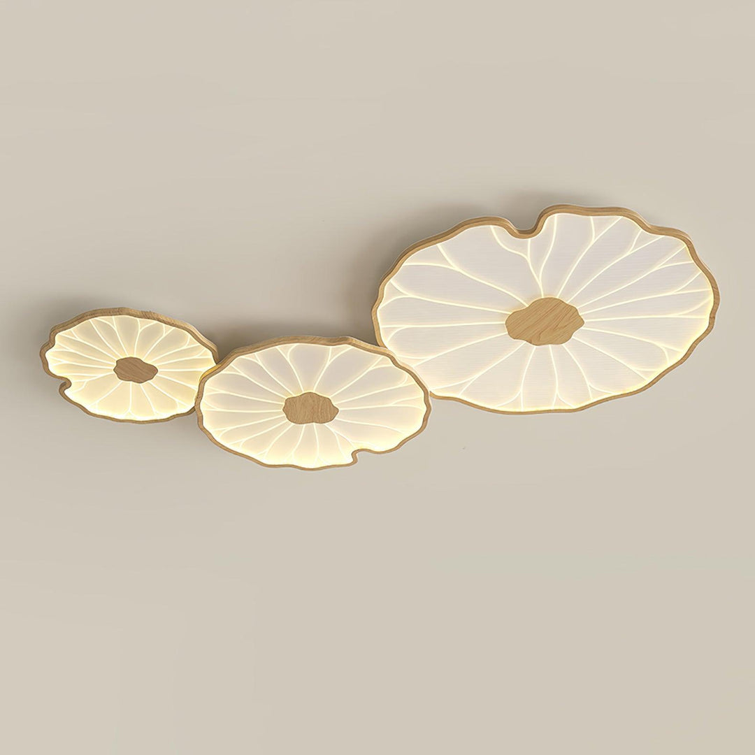 Plafonnier LED Solara, motif feuille de lotus en bois naturel, idéal pour une ambiance sereine.