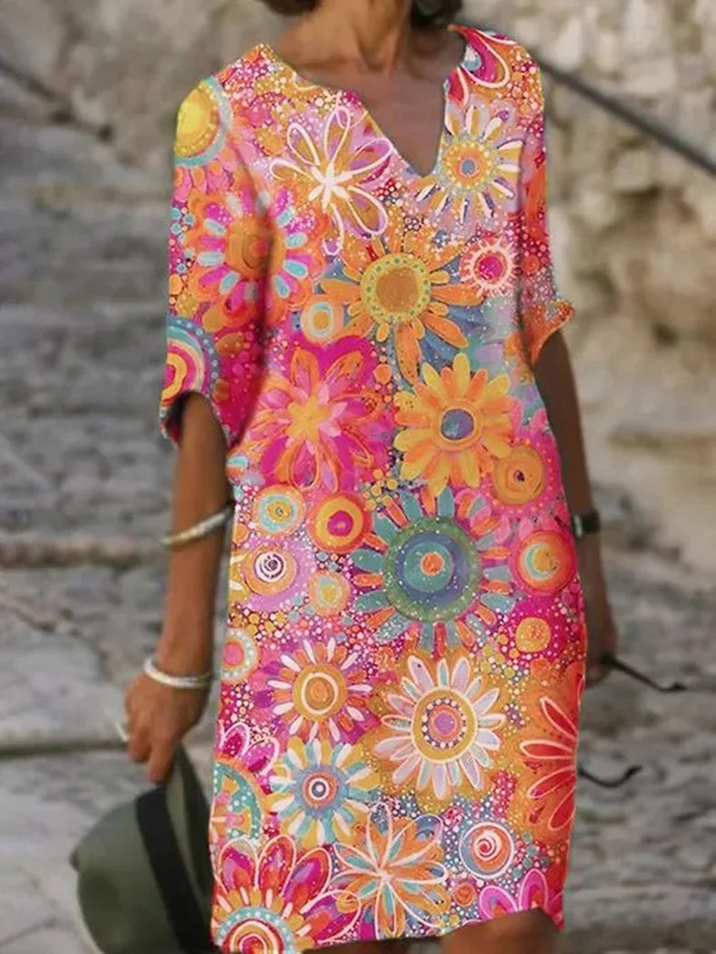 Robe fleurie bohème fluide pour femme, vêtement estival confortable et décontracté, parfaite pour les vacances.