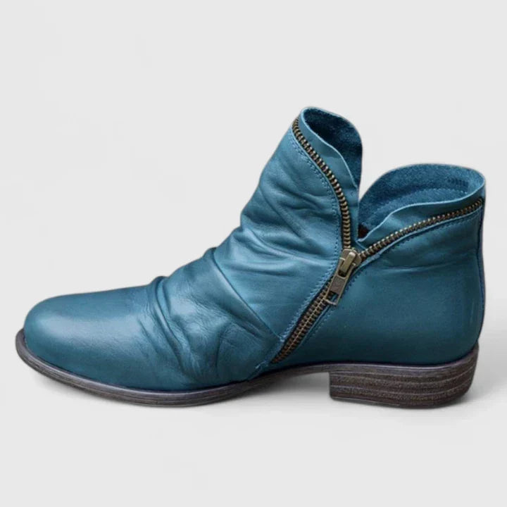 Bottines femme froncées noires élégantes avec zip devant, parfaites pour l'automne-hiver.