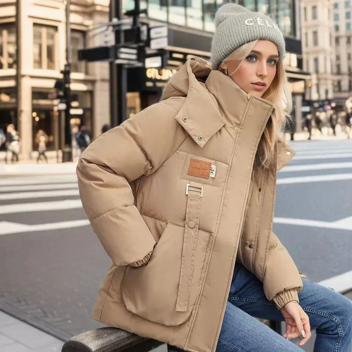 Manteau doudoune femme chaud et imperméable. Veste matelassée hiver pour une protection optimale et un confort douillet.