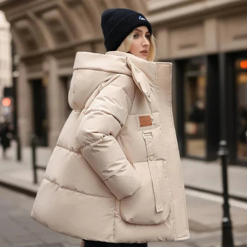 Doudoune femme hiver, manteau chaud et coupe-vent. Veste imperméable pour activités extérieures et protection contre le froid.