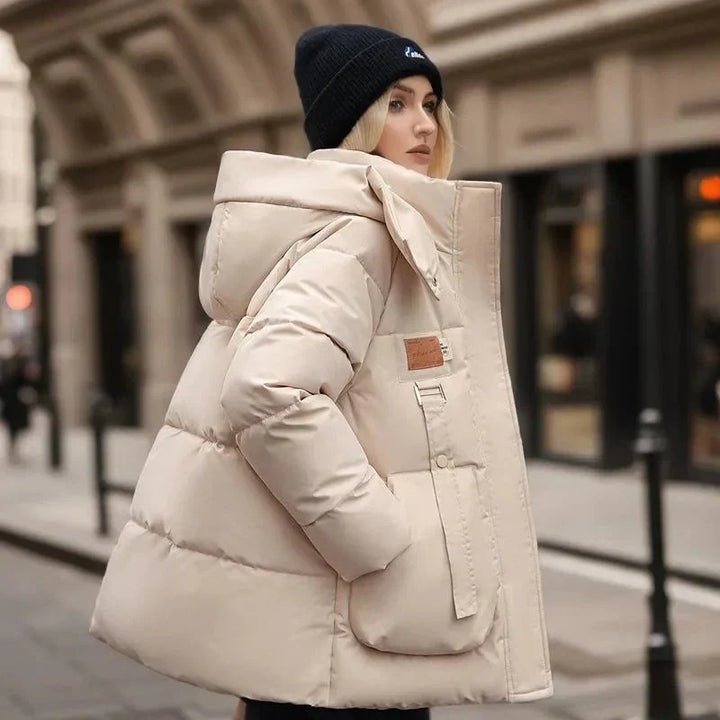 Doudoune femme hiver, manteau chaud et coupe-vent. Veste imperméable pour activités extérieures et protection contre le froid.