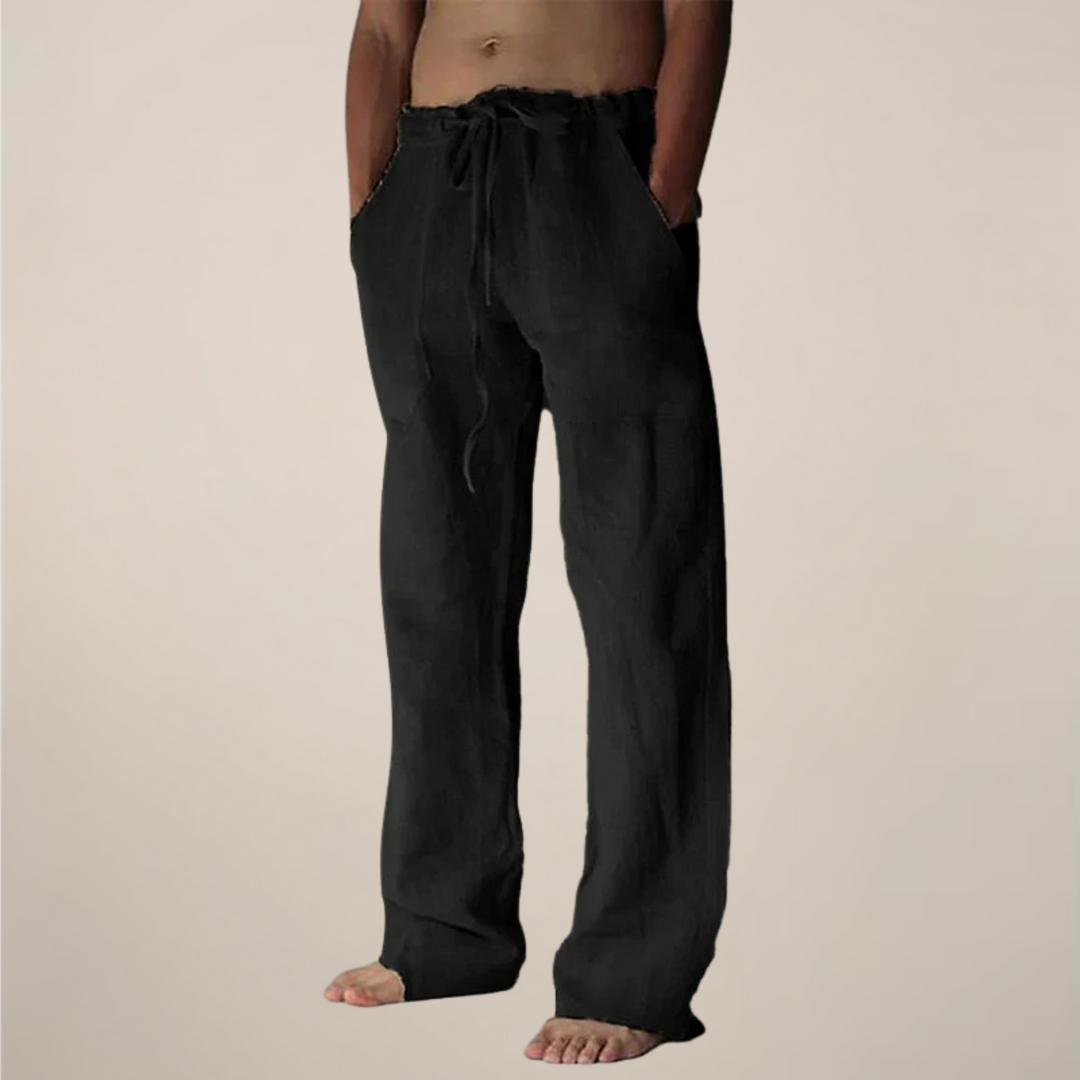 Détail du tissu léger et fluide d'un pantalon large homme décontracté, parfait pour la saison estivale.