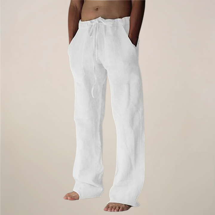 Pantalon large homme décontracté, tissu fluide. Idéal pour un confort estival et un look moderne de loisirs.