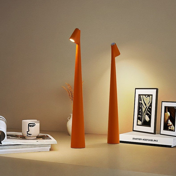 Lampe ambiance LED, portable et rechargeable, design élégant en aluminium.