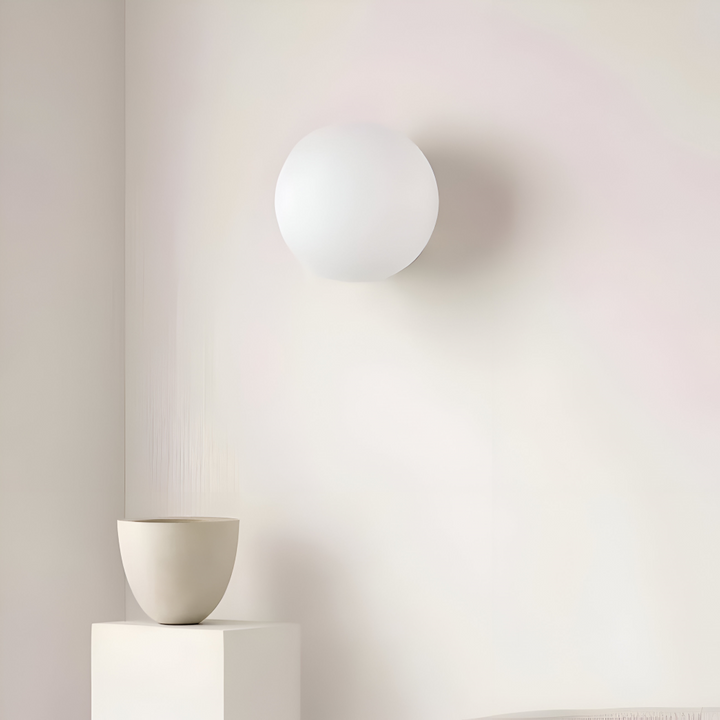 Applique ronde LED pour décoration murale, style minimaliste et lumière douce, idéale pour chambre ou salon.