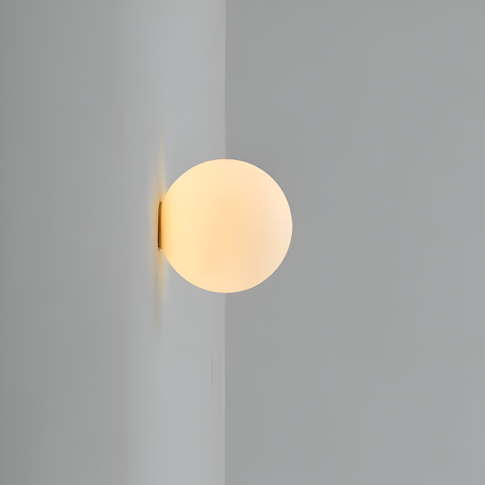 Applique design minimaliste, ronde avec éclairage LED doux intégré, parfaite pour une lumière d'ambiance.