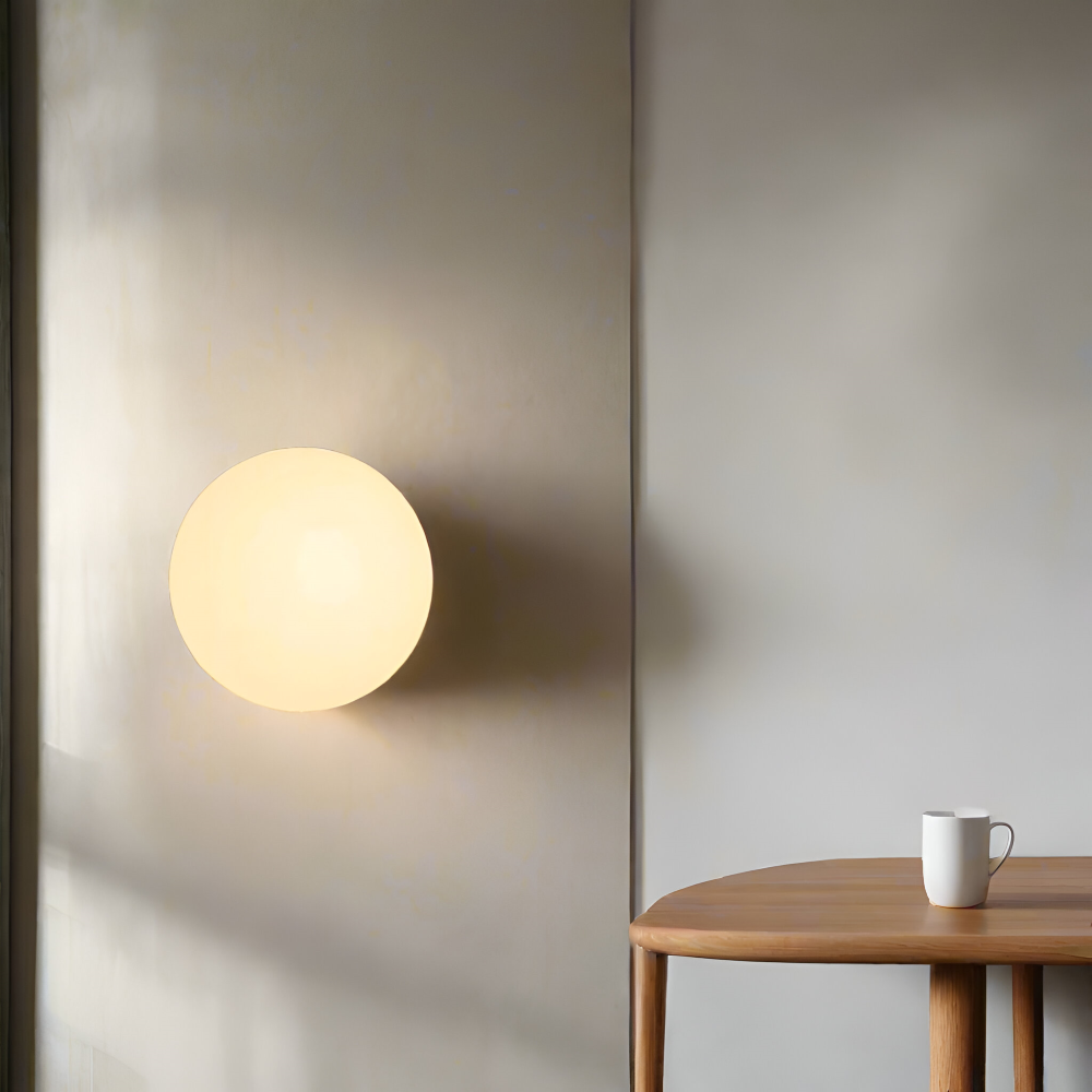 Luminaire mural LED design moderne et rond, crée une ambiance douce pour entrée ou couloir. Décoration murale.