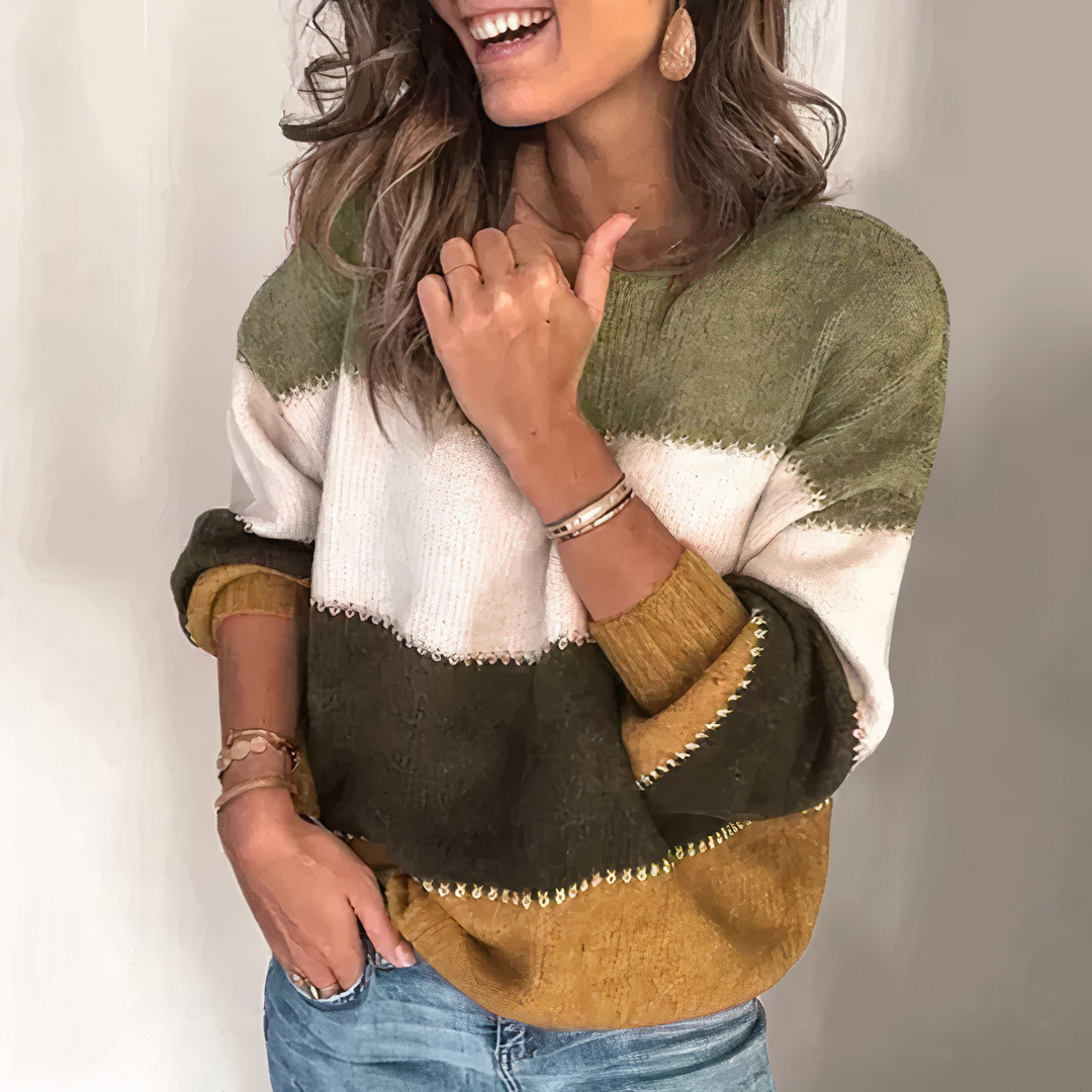 Pull femme doux à rayures, parfait pour la mode hivernale. Ce haut tricoté allie chaleur et style élégant.