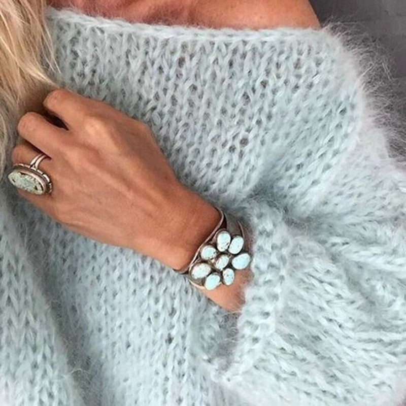 Vêtement femme: Pull tricot doux et chaud, style bohème chic. Idéal pour un look décontracté en automne/hiver.