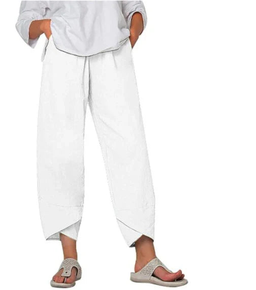 Pantalon décontracté femme, coupe ample et moderne, parfait pour les loisirs d'été. Taille élastique confortable.