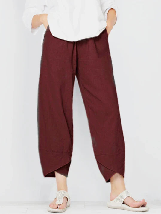 Pantalon large femme décontracté avec taille élastique. Léger et ample, parfait pour un été confortable et stylé.